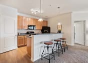 Thumbnail 7 of 47 - Kitchen Island with Dining space at Tapestry Park, Chesapeake, VA