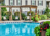 Thumbnail 2 of 47 - Relaxing Pool Area With Sundeck at Tapestry Park, Chesapeake, VA