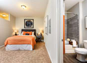 Thumbnail 22 of 38 - Master bedroom with en-suite batroom at Tapestry Bocage Apartments in Baton Rouge, LA
