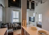 Thumbnail 7 of 41 - Kitchen Area With Living Room View at The Tower Apartments, Tuscaloosa