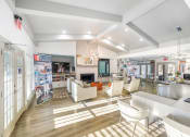 Thumbnail 17 of 24 - clubhouse and seating area at Retreat at Brightside Apartments in Baton Rouge, LA