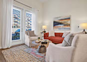 Thumbnail 10 of 55 - A modern living room with space allowing multiple furniture arrangements, with bright natural light and tall ceilings