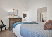 Thumbnail 14 of 55 - Model apartment bedroom with a bright natural light and tall ceilings