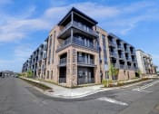Thumbnail 48 of 55 - Building Exterior View of Midrise Artisan Flats Apartments in Birmingham, AL