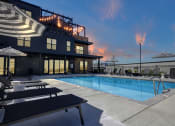 Thumbnail 23 of 55 - Twilight Pool View at Artisan Flats Apartments in Birmingham, AL