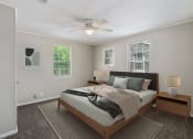 Thumbnail 9 of 22 - light and bright bedroom with natural light  Living Room with wood flooring at Midtown Oaks Townhomes in Mobile, AL