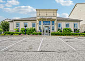 Thumbnail 19 of 21 - A building with the name Brook Lane on it.