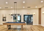 Thumbnail 18 of 25 - the preserve at ballantyne commons clubhouse with pool table and gym