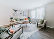 Thumbnail 1 of 22 - Living Room with wood flooring at Midtown Oaks Townhomes in Mobile, AL