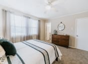 Thumbnail 17 of 22 - Bedroom with en-suite bathroom at Midtown Oaks Townhomes in Mobile, AL