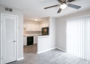 Thumbnail 1 of 32 - Living Area With Kitchen View at Arbor Pointe at Hillcrest, Little Rock, Arkansas