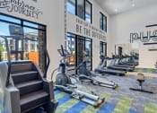 Thumbnail 18 of 50 - a gym with treadmills and stairmaster at Tapestry Overbrook in McDonough, Georgia