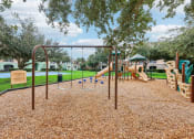 Thumbnail 24 of 33 - our playground is equipped with a variety of equipment for children to enjoy
