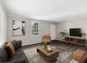 Thumbnail 7 of 22 - spacious living room  Living Room with wood flooring at Midtown Oaks Townhomes in Mobile, AL