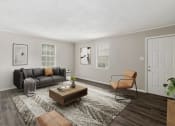 Thumbnail 6 of 22 - renovated apartment homes  Living Room with wood flooring at Midtown Oaks Townhomes in Mobile, AL