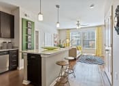 Thumbnail 4 of 48 - Fitted Kitchen With Island Dining at Tattersall Chesapeake, Chesapeake