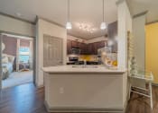 Thumbnail 4 of 21 - a kitchen with a counter top and a sink