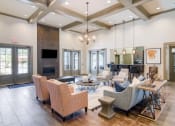 Thumbnail 1 of 21 - a living room filled with furniture and a fire place