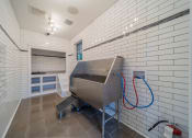 Thumbnail 18 of 21 - a bath room with a bath tub and a sink