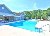 Thumbnail 2 of 25 - the swimming pool at the resort style pool house with chairs around it