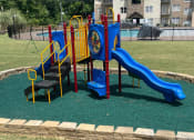 Thumbnail 12 of 18 - a childrens playground with slides and chairs in a park