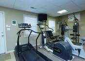 Thumbnail 13 of 18 - the gym at the at the village apartments mo