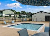 Thumbnail 2 of 26 - Swimming pool with tanning deck Mirabelle Apartments in Mobile, Alabama