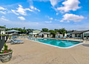 Thumbnail 19 of 26 - Swimming pool view at Mirabelle Apartments in Mobile, AL.