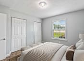 Thumbnail 14 of 26 - Bedroom with natural light  at Mirabelle Apartments in Mobile, Alabama