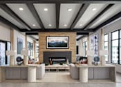 Thumbnail 3 of 22 - A modern living room with a fireplace and a large painting above it.