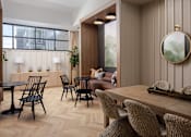 Thumbnail 2 of 22 - A modern dining room with wooden furniture and a large window.