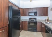 Thumbnail 10 of 23 - Efficient Appliances In Kitchen at Ascend at Red Mountain, Mesa