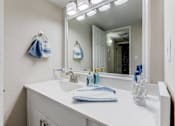 Thumbnail 17 of 18 - a bathroom with a sink and a mirror at Stonebridge, Phoenix, AZ, 85032