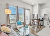 Thumbnail 9 of 25 - Open concept living room and kitchen at Avion at West Lemmon Apartments, Dallas, 75235