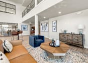 Thumbnail 13 of 24 - Living Room with a Rug at V on Broadway Apartments, Arizona