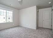 Thumbnail 12 of 17 - Room with window and closet at The Village at Church & Main, Layton,  84041