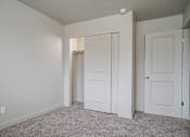 Thumbnail 11 of 17 - Room with carpeted floor at The Village at Church & Main, Layton