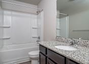 Thumbnail 10 of 17 - Bathroom with large mirror at The Village at Church & Main, Layton, UT