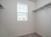 Thumbnail 17 of 18 - bedroom walk in closet