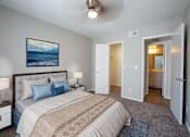 Thumbnail 14 of 18 - A bedroom with a large bed and a painting on the wall. at Stonebridge, Arizona, 85032