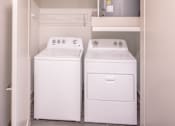 Thumbnail 13 of 25 - Inunit laundry room with washer and dryer at Avion at West Lemmon Apartments, Texas