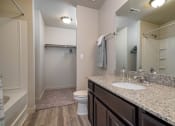 Thumbnail 14 of 18 - Odell crossing bathroom and closet