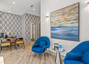 Thumbnail 23 of 25 - Office reception area with patterned accent wall at Avion at West Lemmon Apartments, Texas, 75235