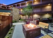 Thumbnail 19 of 23 - Firepit with beautiful pool views at Ascend at Red Mountain, Mesa