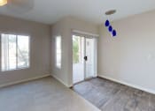 Thumbnail 18 of 26 - Dining Room leading out to Private Patio