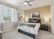 Thumbnail 7 of 24 - Bedroom with a Large Bed at V on Broadway Apartments, Arizona