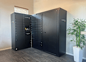 Thumbnail 26 of 37 - A LUXER branded storage unit is in a room with a plant.