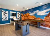 Thumbnail 5 of 25 - Clubhouse Game Room with Foosball Table at Enclave at Paradise Valley, Phoenix