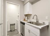 Thumbnail 19 of 25 - Efficient Appliances like a Dishwasher and Sink with a Goose Neck Faucet at Enclave at Paradise Valley, AZ 85032