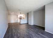 Thumbnail 15 of 25 - Living Room Space with Grey Wall and Plank Flooring Drenched in Natural Light at Enclave at Paradise Valley, Phoenix